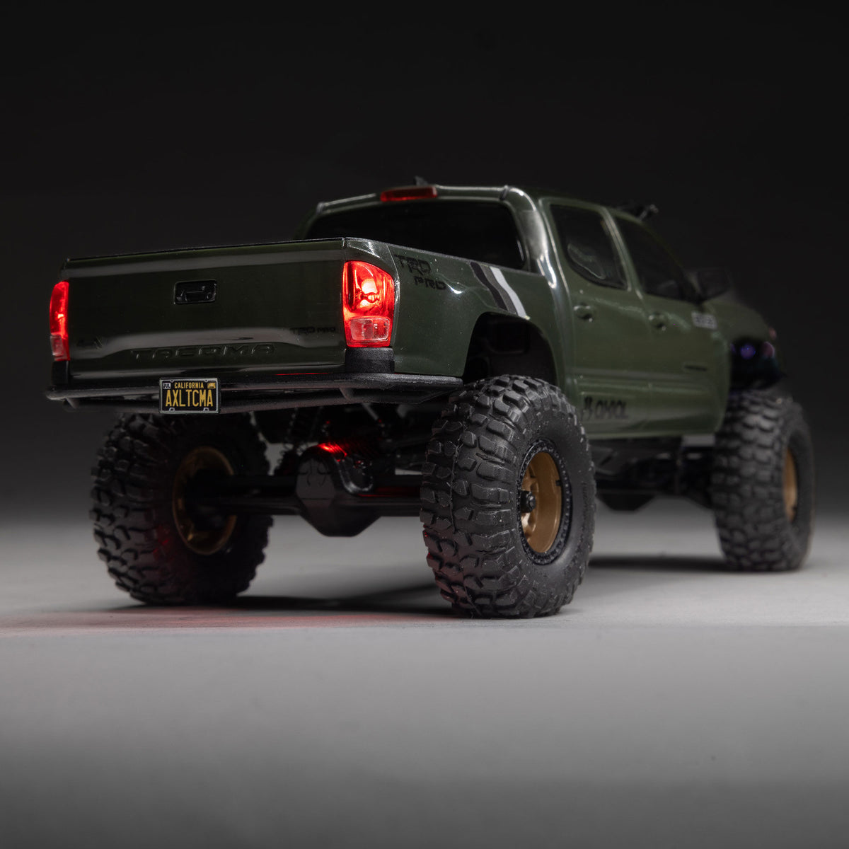 Axial SCX30 Toyota Tacoma TRD Pro Extreme Off-Road Edition 4X4 RTR Brushed Rock Crawler w/2.4GHz Radio, Battery & Charger (Green) - AXI-3289T1
